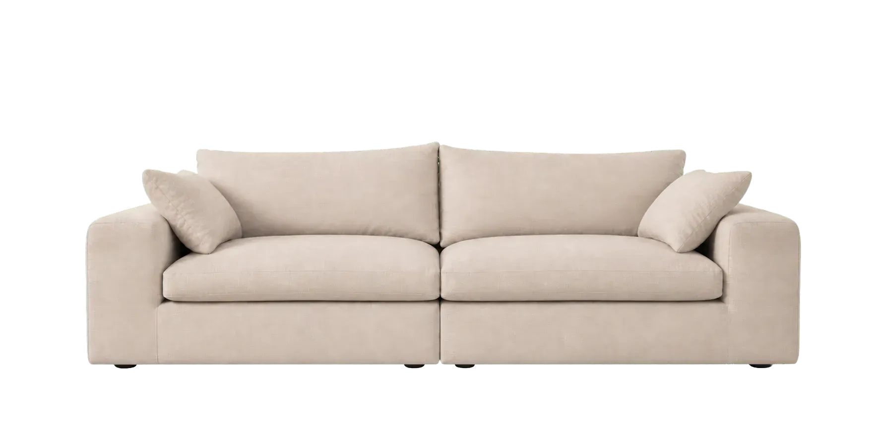 Oatmeal fabric sofa isolated on a warm ivory background